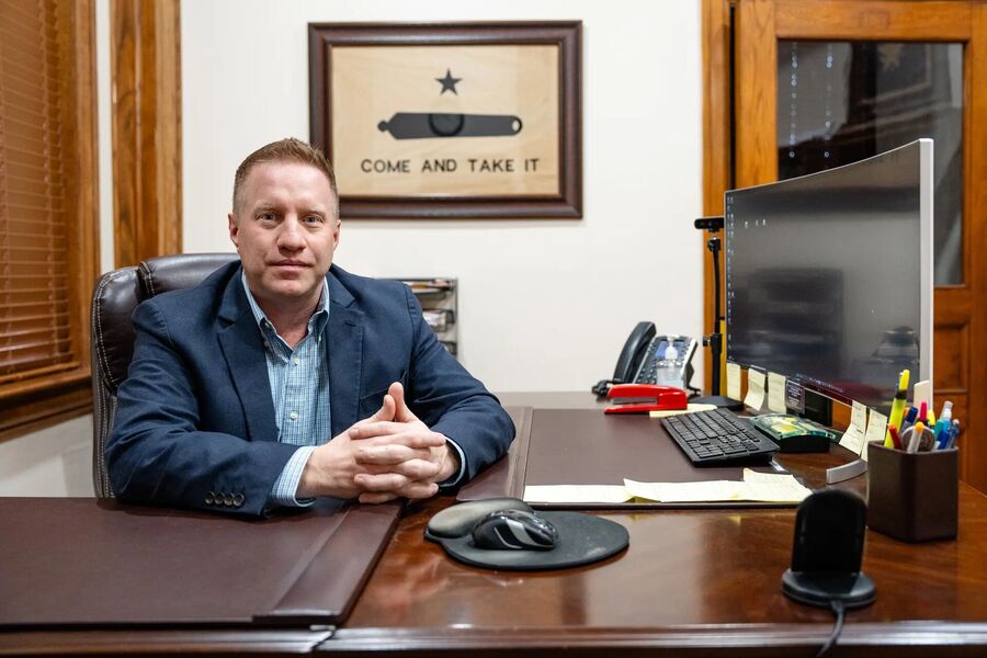 Click to enlarge Brent Smith, Kinney County attorney, in Brackettville, Texas
