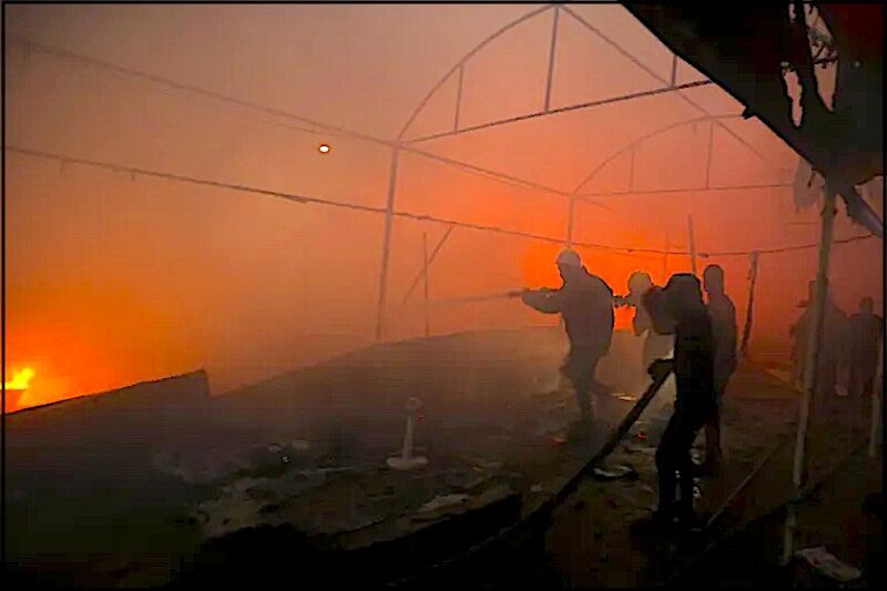 Click to enlarge people battle fire