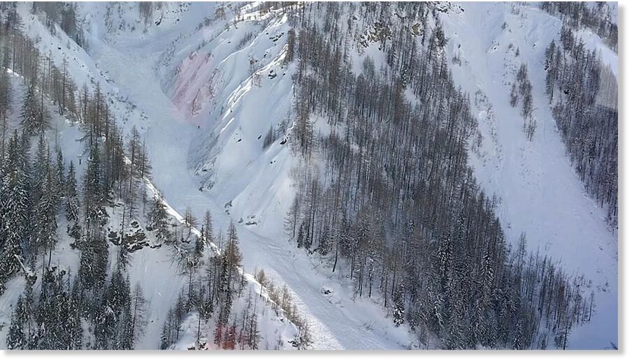 This handout image released by the Italian Alpine Rescue shows the avalanche that killed two men in the Couloir Vesses, a well-known freeride route in Courmayeur, in the upper Val Veny, northern Italy, Sunday, Feb. 15, 2026.