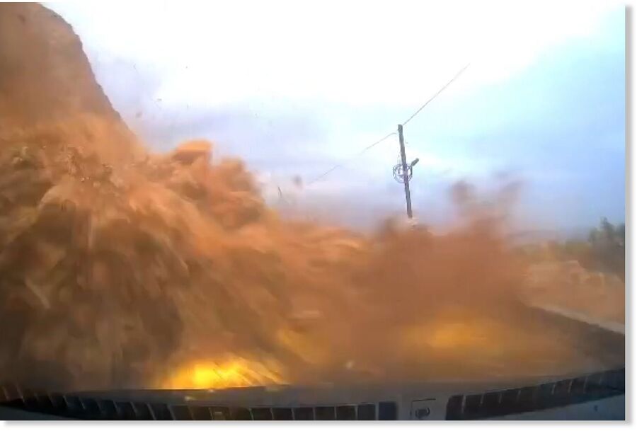 Click to enlarge sudden landslide buries car ..