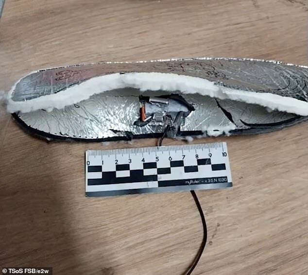 Click to enlarge boobytrapped boot heaters russia