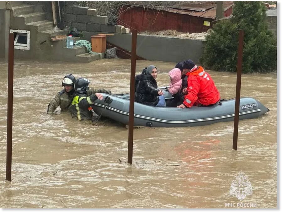 Click to enlarge Emergency specialists evacuate residents from a flooded district in the city of Makhachkala in the Caucasus region of Dagestan, Russia, in this picture released March 28, 2026. Emergency Ministry of Russia/Handout via REUTERS