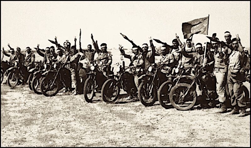 Click to enlarge Iranian guards and volunteers