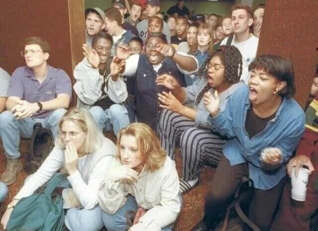 Click to enlarge Students at Augustana College react to the verdict of O. J. Simpson’s murder trial, October 3, 1995