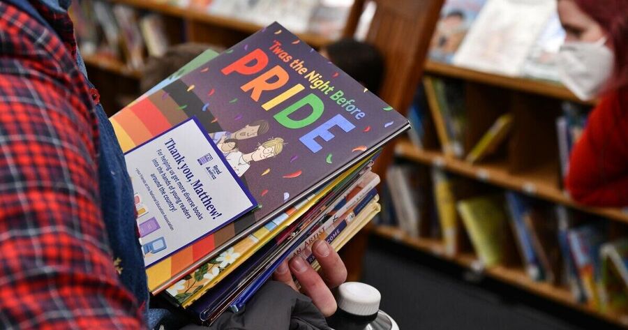Click to enlarge Library with PRIDE books