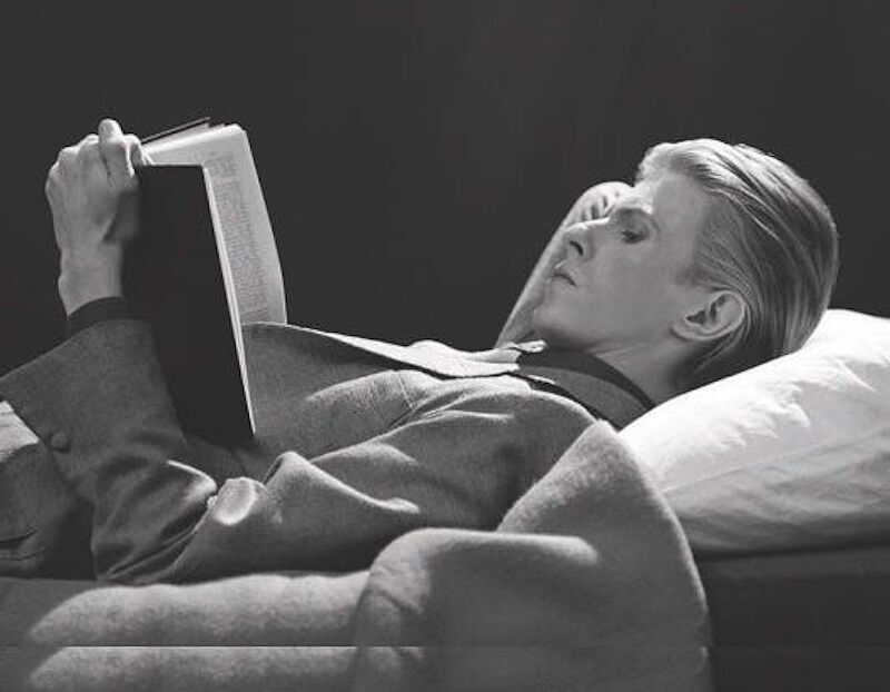 Click to enlarge david bowie reading book literacy