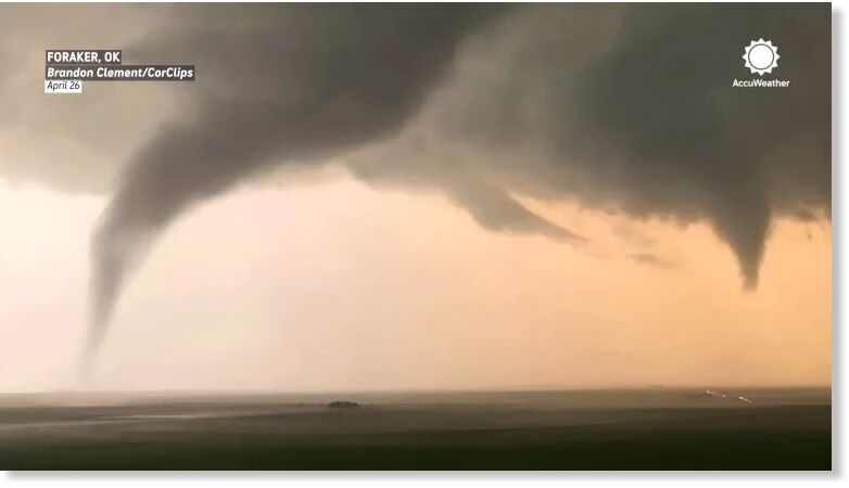 Click to enlarge Storm chasers saw a rare weather phenomenon in Oklahoma on Thursday: A pair of tornadoes, one circling the other.