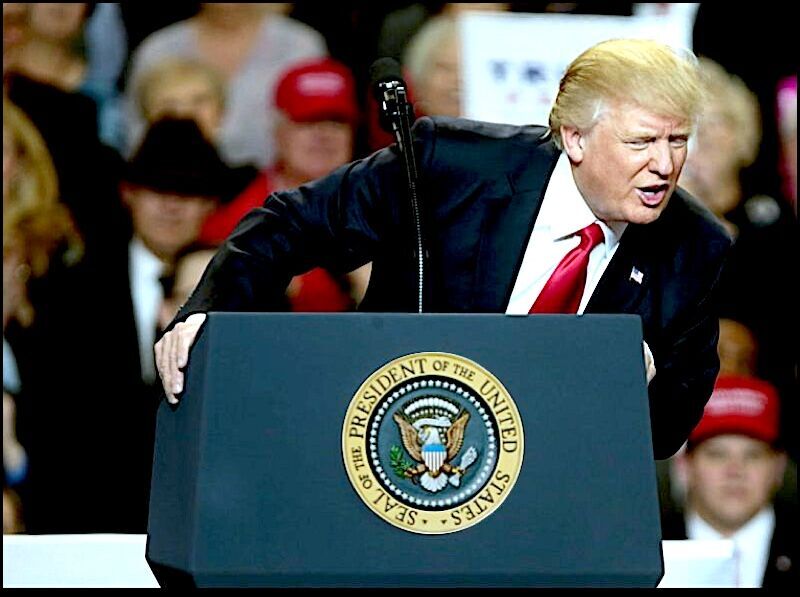 Click to enlarge Trump at podium