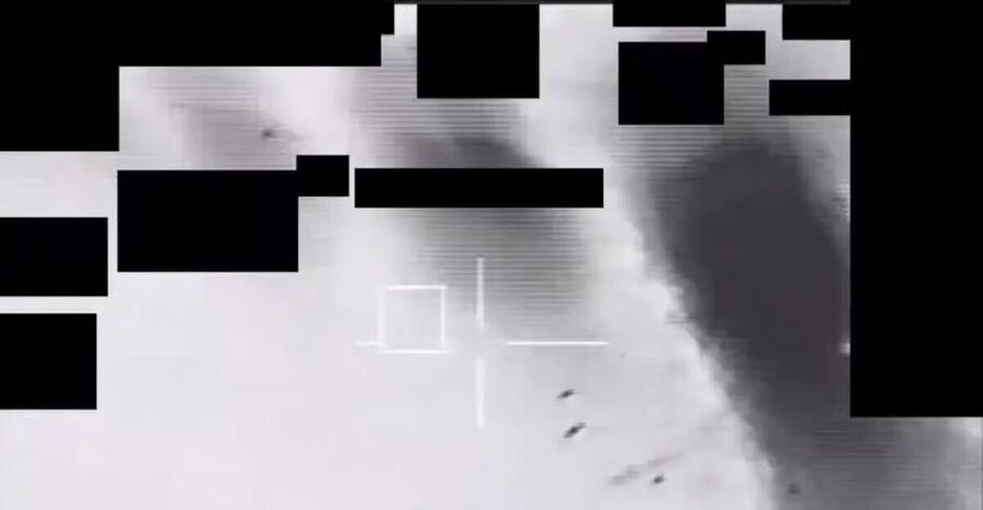 Fragments fall from the UAP after it was shot