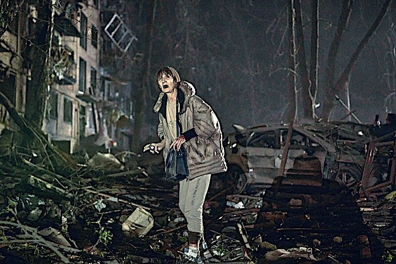 woman Kiev rubble