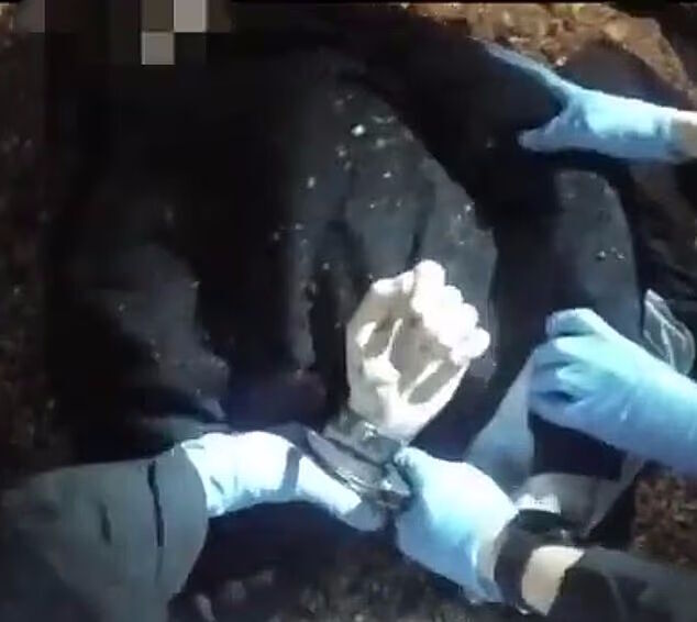 Click to enlarge henry nowak murder bodycam police handcuffs