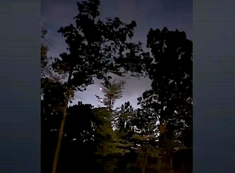 Click to enlarge Two bright dots in back yard