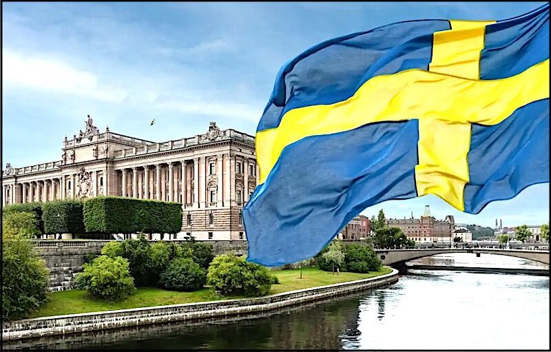 Click to enlarge Swedish flag and Parliament House