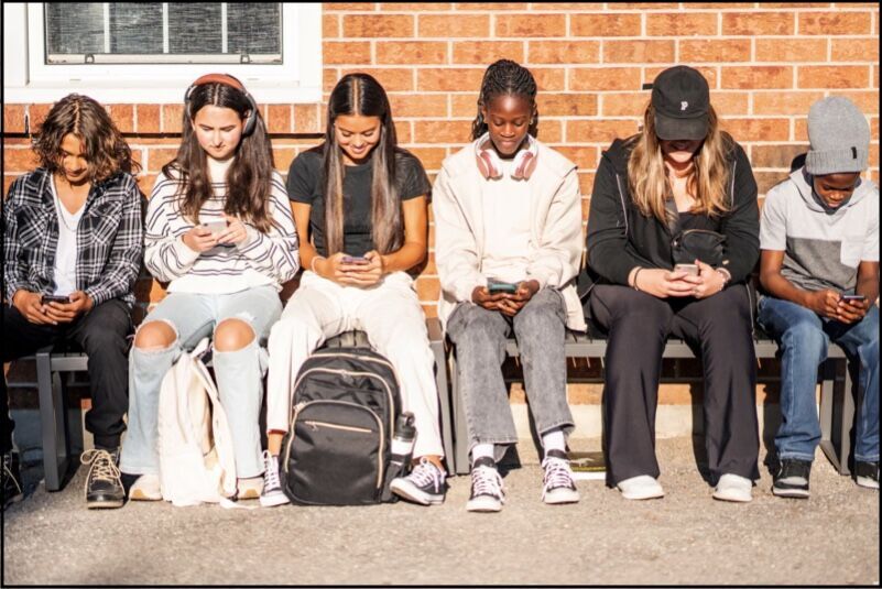Click to enlarge Children with cell phones