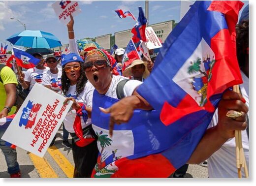 Click to enlarge haitians protest