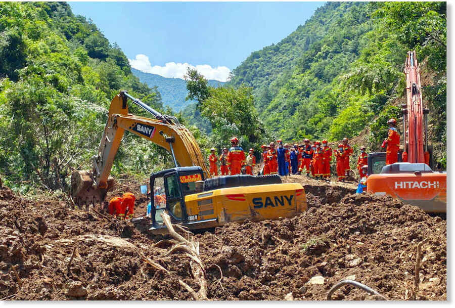 Click to enlarge In this photo released by Xinhua News Agency, rescuers conduct search and rescue at the site of a landslide at a village in Nanhe township of Tanchang County, Longnan City, northwest China's Gansu Province on Tuesday, July 7, 2026