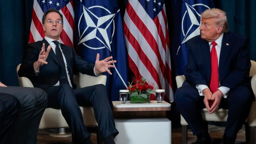 Click to enlarge Rutte and Trump