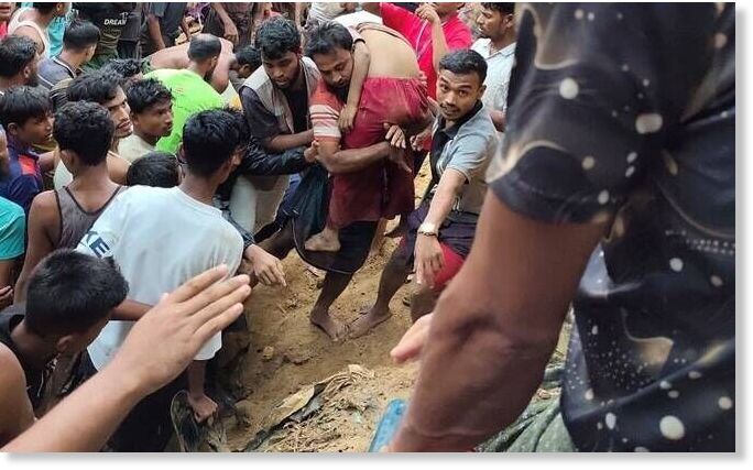 Click to enlarge Community members rescue survivors of a landslide that hit a madrassa in a Rohingya refugee camp, killing eight children in Cox’s Bazar, Bangladesh, July 8, 2026.
