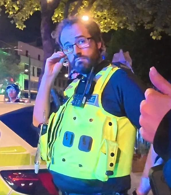 Click to enlarge britain police arrest cameraman