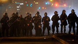 riot police advance