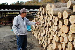 Tomio Takahashi checks logs