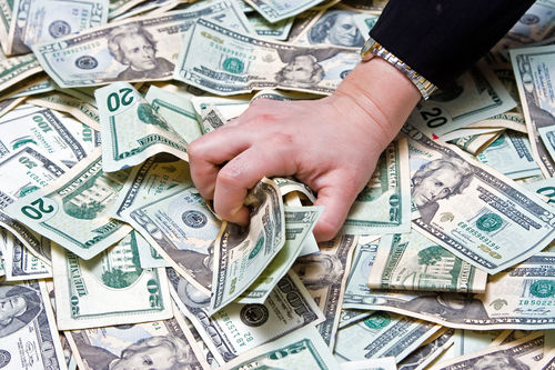 hand in money