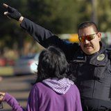Brownsville Police officer directs a parent