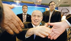 Click to enlarge Benjamin Netanyahu at a an event with member of the Likud party in 2007