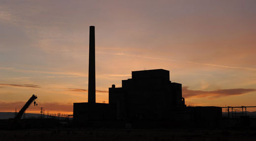 sun sets behind B Reactor