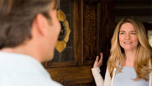 Click to enlarge woman opening door