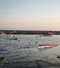 Fishing boats and other debris