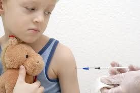 child w/ teddy bear vaccination
