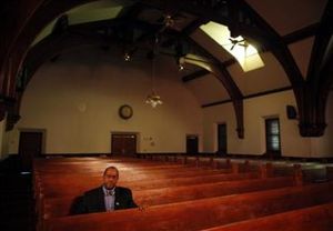 Click to enlarge Reverend Gregory G. Groover sits for a portrait
