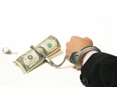 hand handcuffed to money graphic