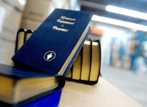 Click to enlarge A stack of New Testament Bibles