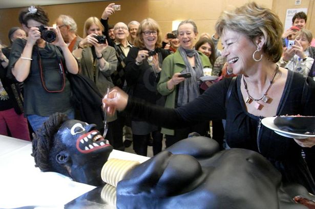 Click to enlarge racist cake