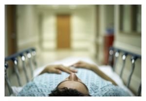 Man on Hospital Bed