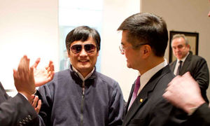Chen Guangcheng, left, with the US ambassador to China, Gary Locke, before leaving the embassy where he spent six days after fleeing from house arrest. 