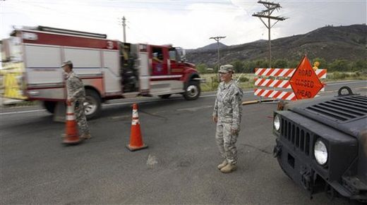 FILE - In this Friday, June 15,2012 file photo Army National Guardsmen