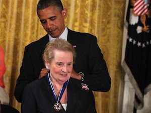President Obama presents former U.S. Secretary of State Madeleine Albright with a Presidential Medal of Freedom, May 29, 2012, despite her role in and public defense of the war crimes of the Clinton administration. 