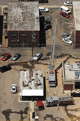 Click to enlarge apartment complex in which shooting suspect James Holmes lived is surrounded by fire engines