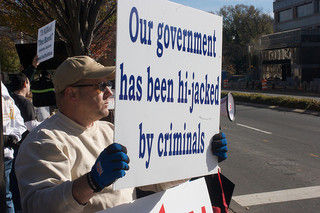 bank protester & sign