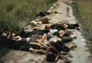 bodies of Vietnamese men, women and children piled along a road in My Lai