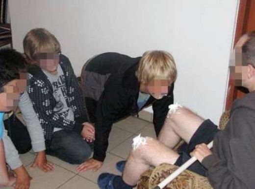 Click to enlarge young teens licking cream off a priest's knees