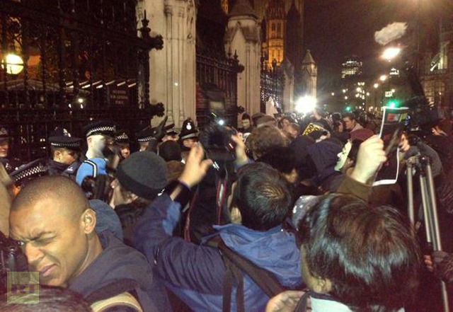 Thousands recreate closing scene of V for Vendetta with march on