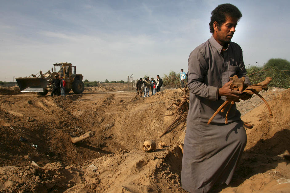 Palestinian man carrying bones 