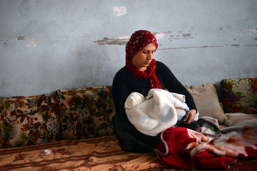 Click to enlarge Syrian Kurdish refugee