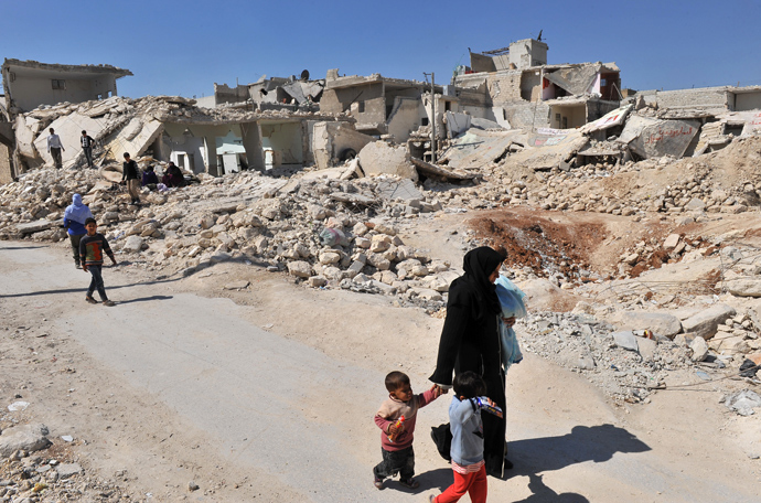 Click to enlarge Destroyed building in Aleppo