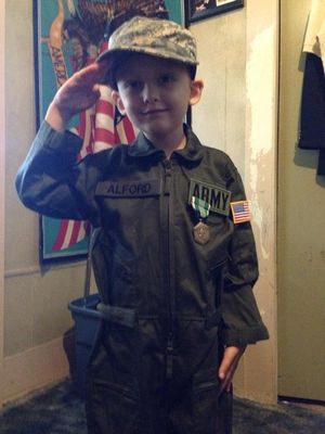 Child with cancer salutes