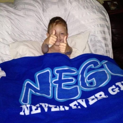 Boy with Cancer; thumbs up